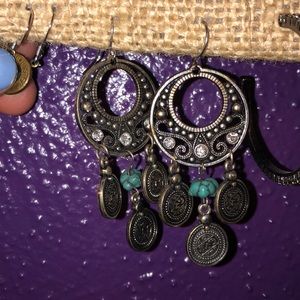 Silver earrings with turquoise stone.